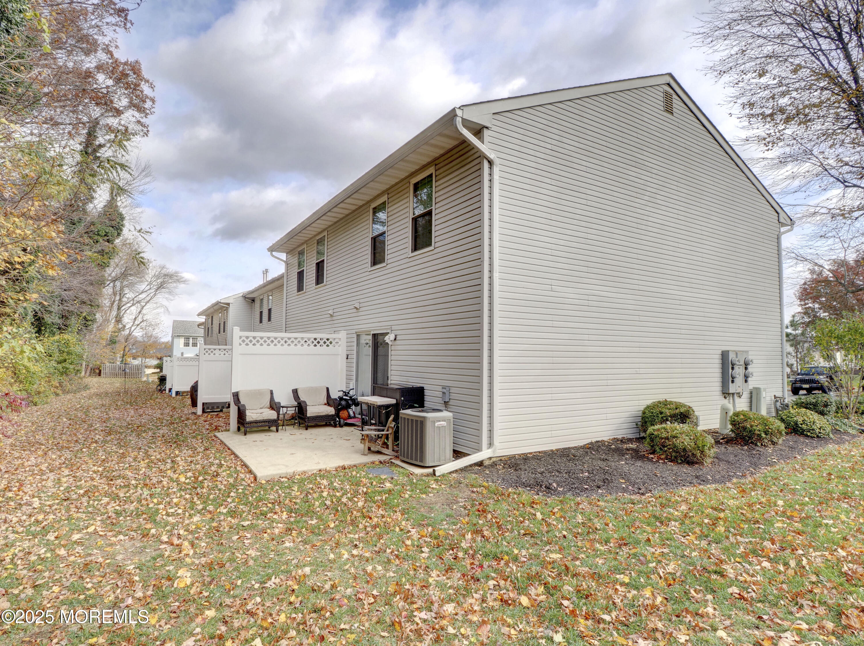 82 Cliffwood Avenue West, Unit 25D Cliffwood, NJ 07721 - Photo 6 of 27 a view of a backyard of a house