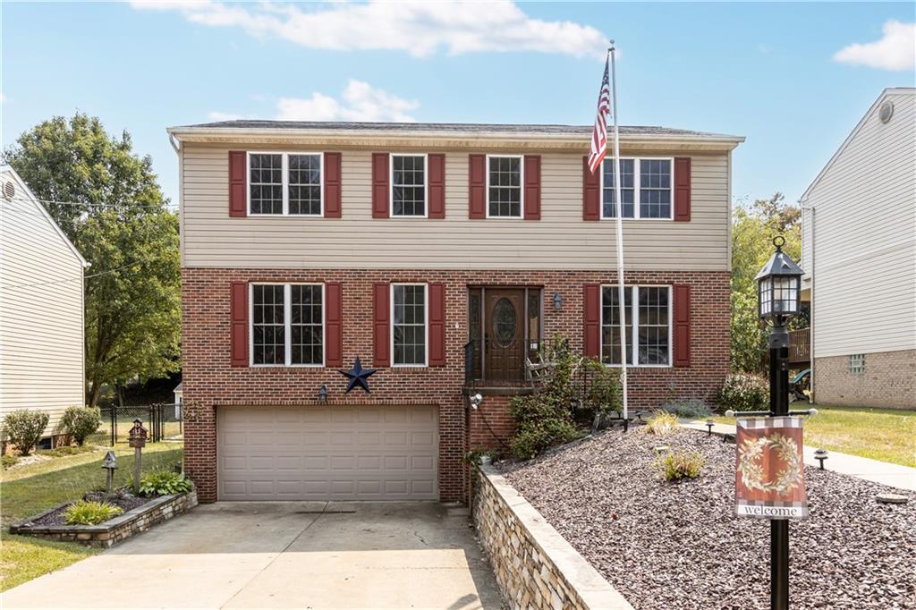 1552 Cathell Road Pittsburgh, PA 15236 - Photo 1 of 34 a front view of a house with yard