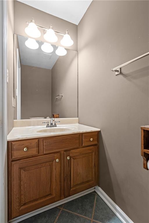 1552 Cathell Road Pittsburgh, PA 15236 - Photo 16 of 34 a bathroom with a sink vanity and a mirror
