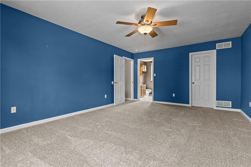 1552 Cathell Road Pittsburgh, PA 15236 - Photo 17 of 34 a view of an empty room with a chandelier fan