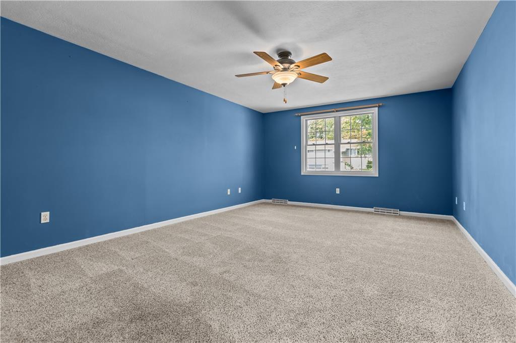 1552 Cathell Road Pittsburgh, PA 15236 - Photo 18 of 34 a view of an empty room with a window