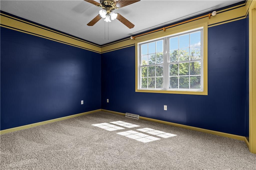 1552 Cathell Road Pittsburgh, PA 15236 - Photo 21 of 34 a view of an empty room with a window