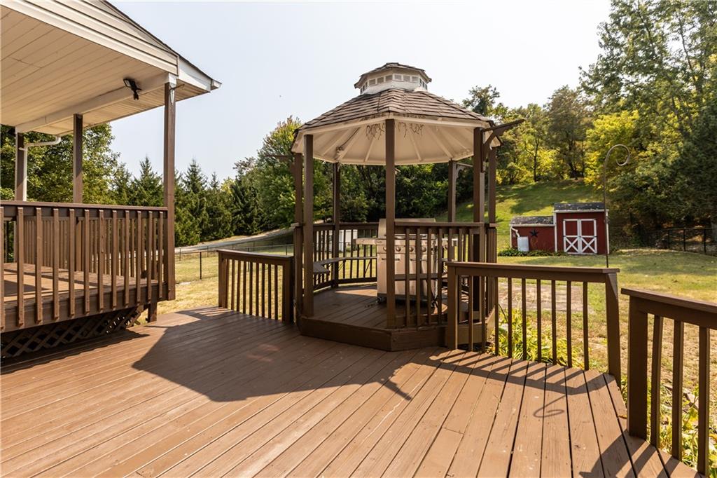 1552 Cathell Road Pittsburgh, PA 15236 - Photo 27 of 34 a view of a wooden deck with a patio