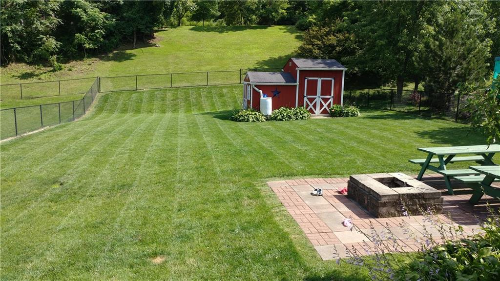 1552 Cathell Road Pittsburgh, PA 15236 - Photo 29 of 34 a view of backyard with table and chairs
