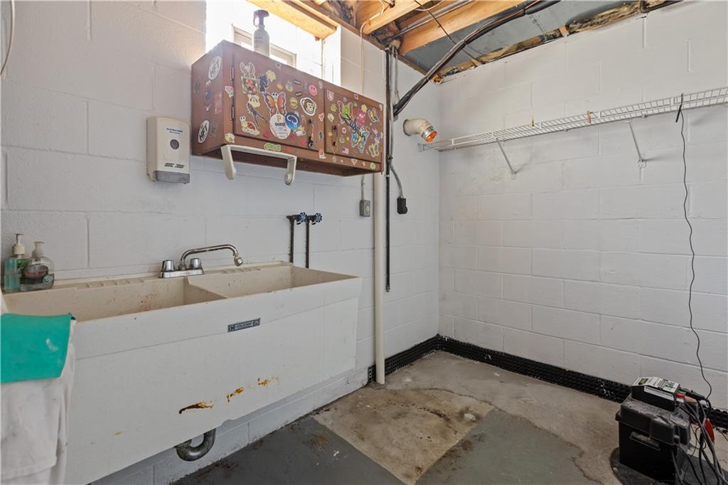 1552 Cathell Road Pittsburgh, PA 15236 - Photo 32 of 34 a bathroom with a sink and a shower