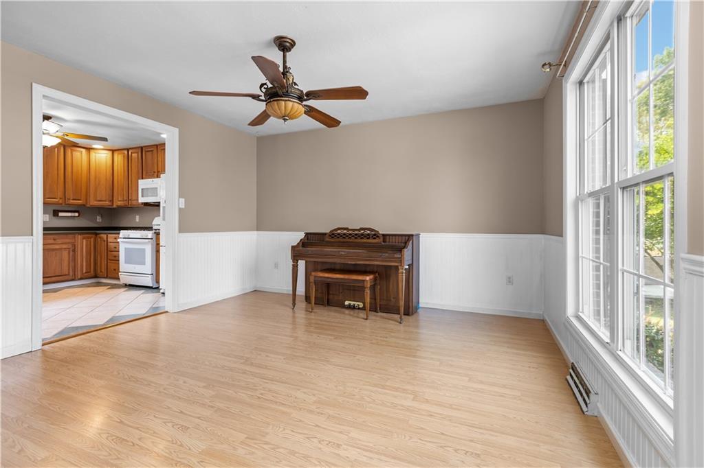 1552 Cathell Road Pittsburgh, PA 15236 - Photo 5 of 34 a view of empty room with wooden floor and fan