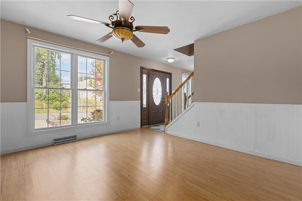 1552 Cathell Road Pittsburgh, PA 15236 - Photo 7 of 34 wooden floor in an empty room with a window