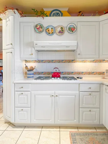 a bathroom with a bathtub and sink