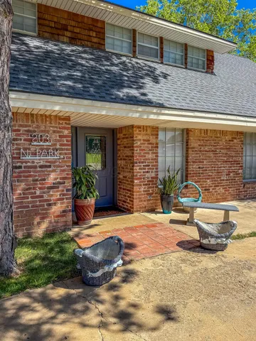 a living room with furniture and window