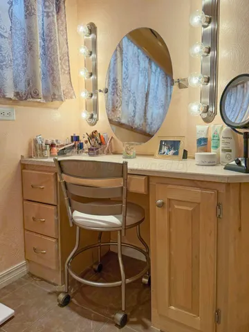 a living room with lots of furniture and a table