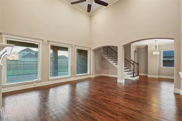 a view of an entryway with wooden floor