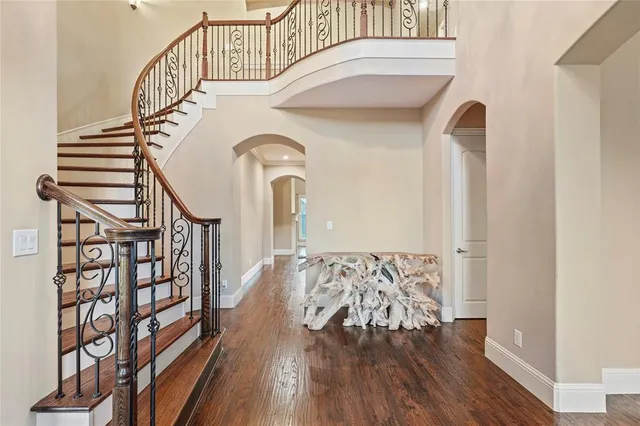 a view of entryway with wooden floor