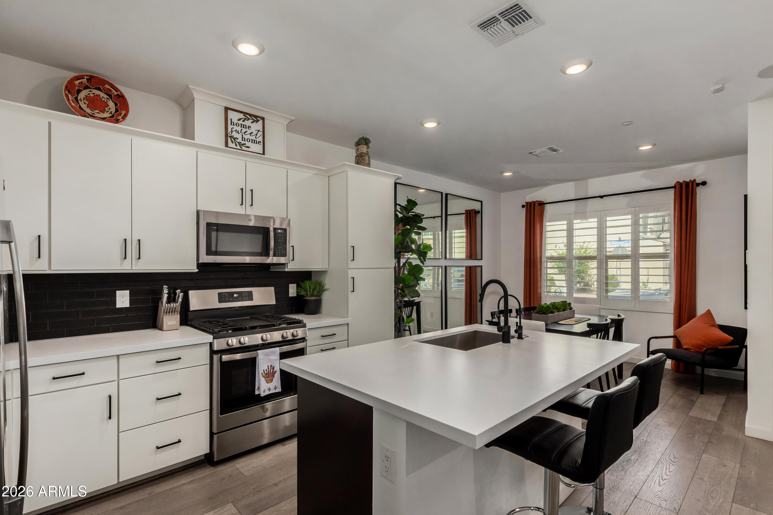 4548 South Renaissance Drive, Unit 103 Gilbert, AZ 85297 - Photo 3 of 19 kitchen 1