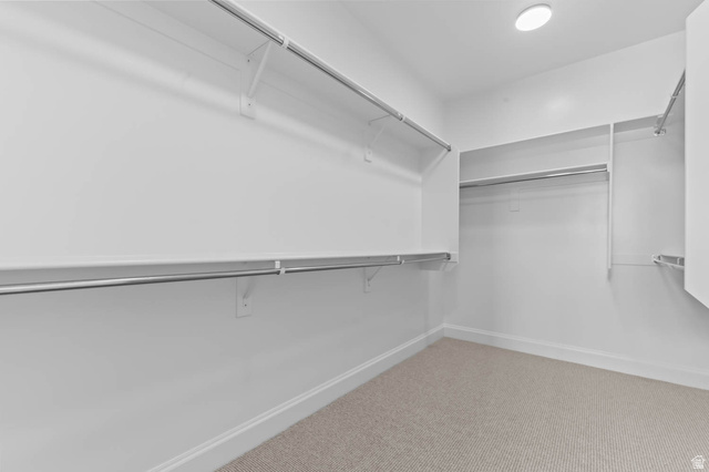 11749 South Halls Crk Road Draper, UT 84020 - Photo 21 of 21 Walk in closet featuring carpet