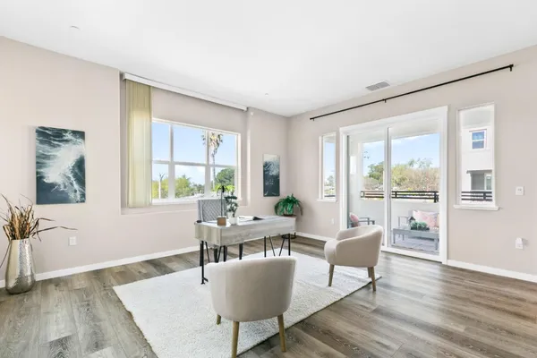 a bedroom with a bed and a cabinets