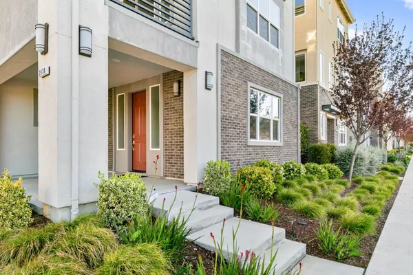 a house view with a outdoor space