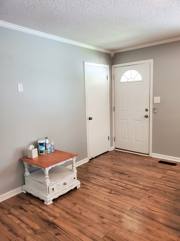 256 Green Shadow Road Cleveland, TN 37323 - Photo 3 of 20 a room with a dresser and mirror