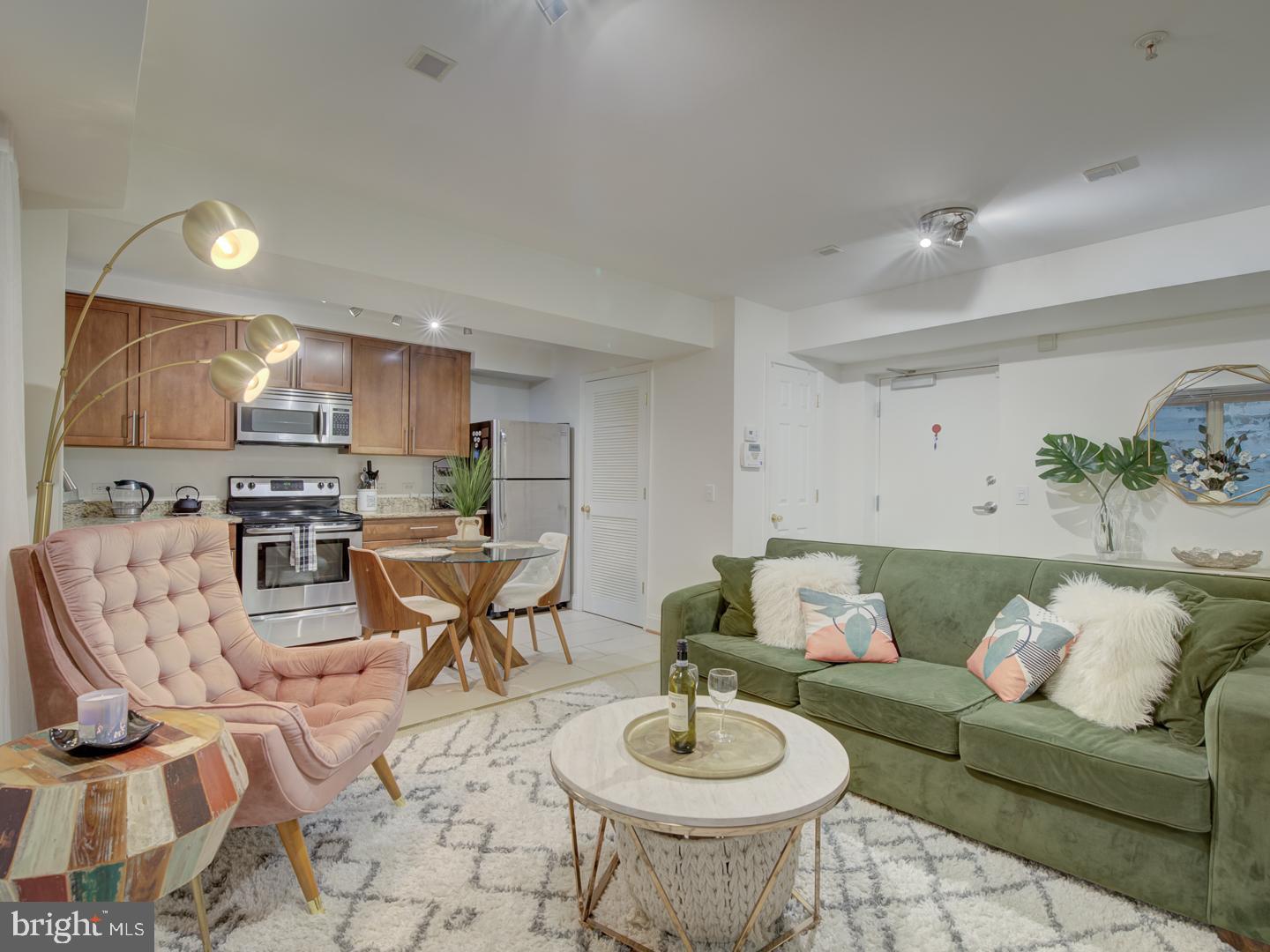 6425 14th Street Northwest, Unit B2 Washington, DC 20012 - Photo 14 of 53 a living room with furniture and kitchen view