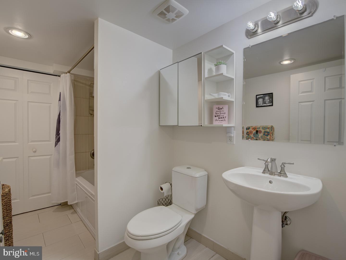 6425 14th Street Northwest, Unit B2 Washington, DC 20012 - Photo 22 of 53 a bathroom with a sink toilet and shower
