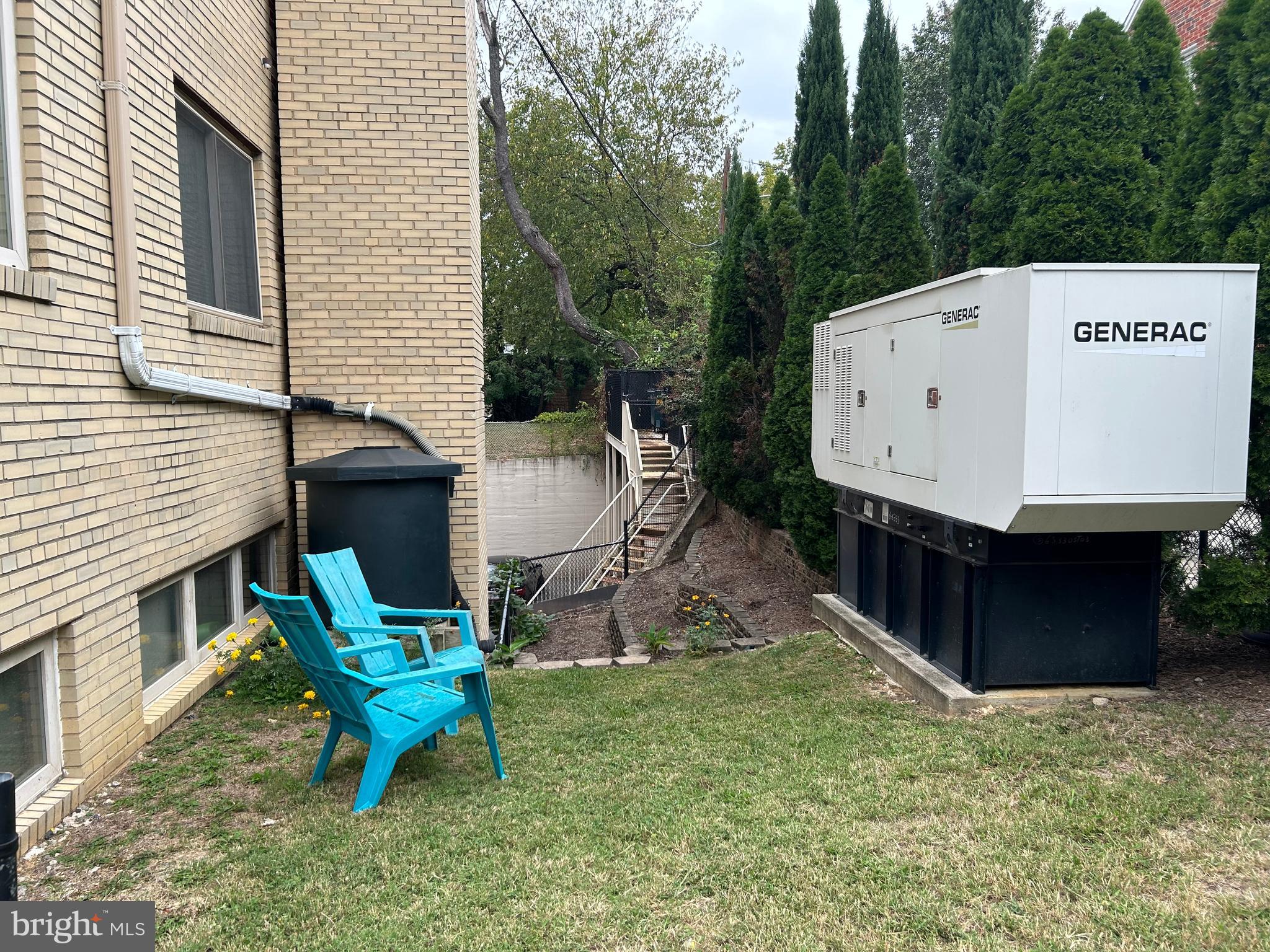6425 14th Street Northwest, Unit B2 Washington, DC 20012 - Photo 31 of 53 a view of a chairs in backyard of the house