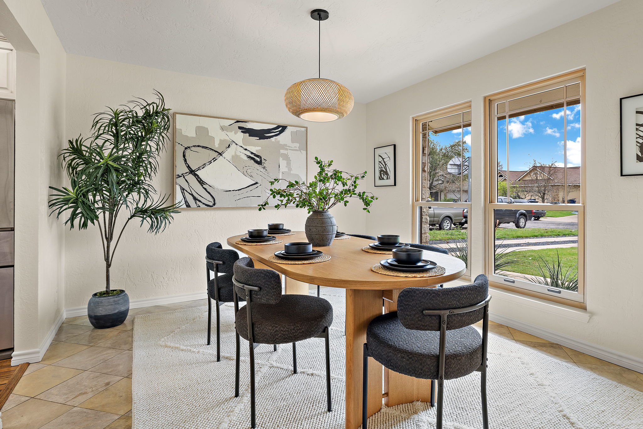 9002 Bancroft Trail Austin, TX 78729 - Photo 13 of 35 Spacious and full of sunlight, this formal dining room is perfect as a dining space or could be used a home office.