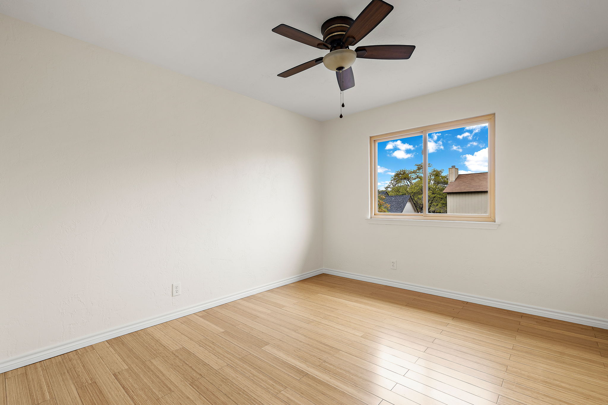 9002 Bancroft Trail Austin, TX 78729 - Photo 19 of 35 All three additional bedrooms upstairs are spacious and bright.