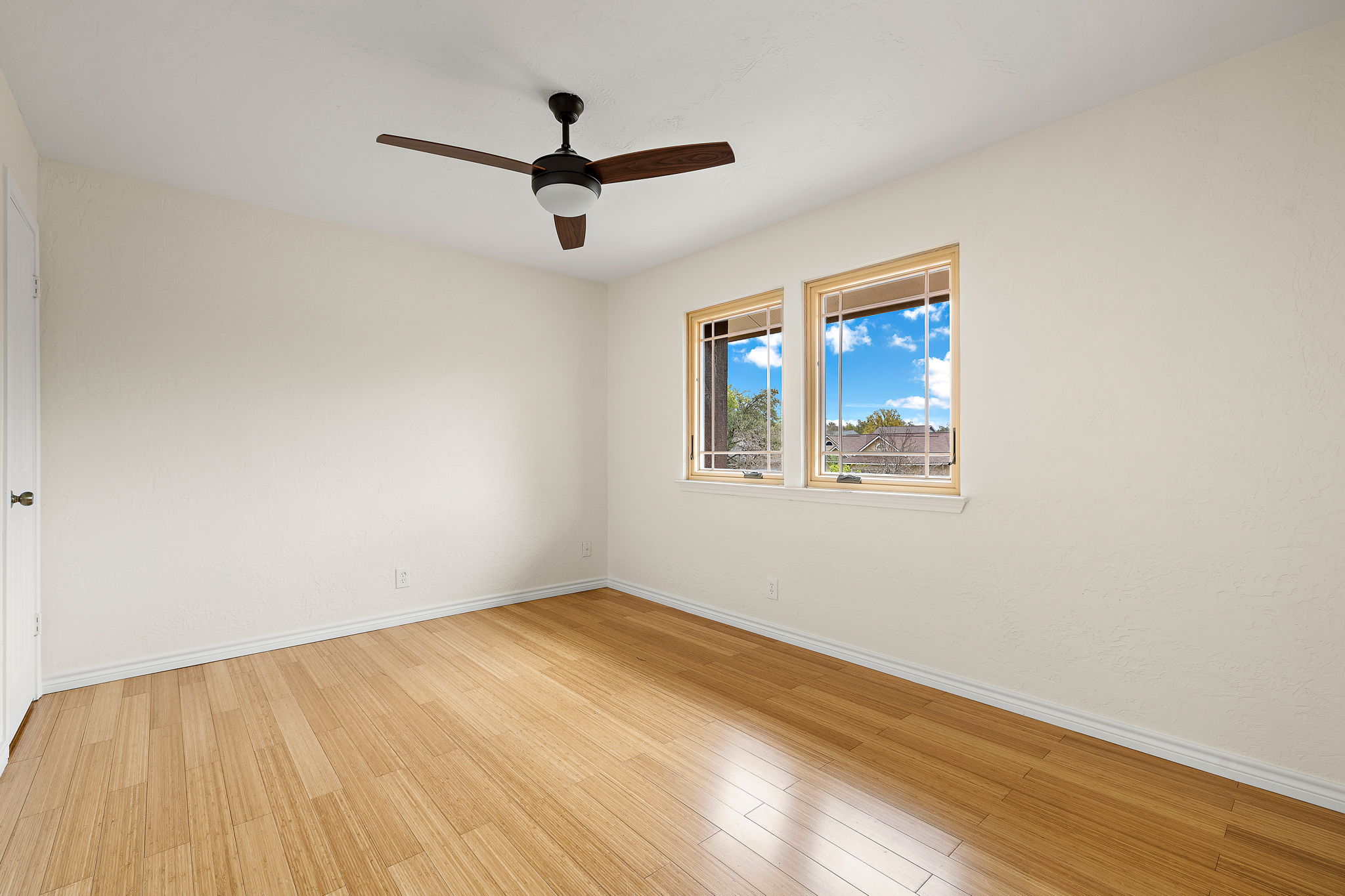 9002 Bancroft Trail Austin, TX 78729 - Photo 20 of 35 All three additional bedrooms upstairs are spacious and bright.