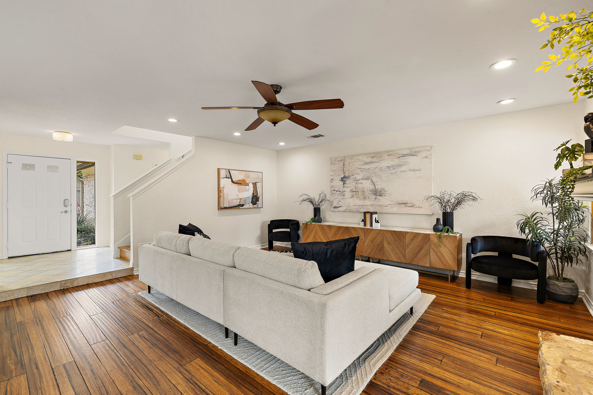 9002 Bancroft Trail Austin, TX 78729 - Photo 8 of 35 View of the living room looking toward the foyer