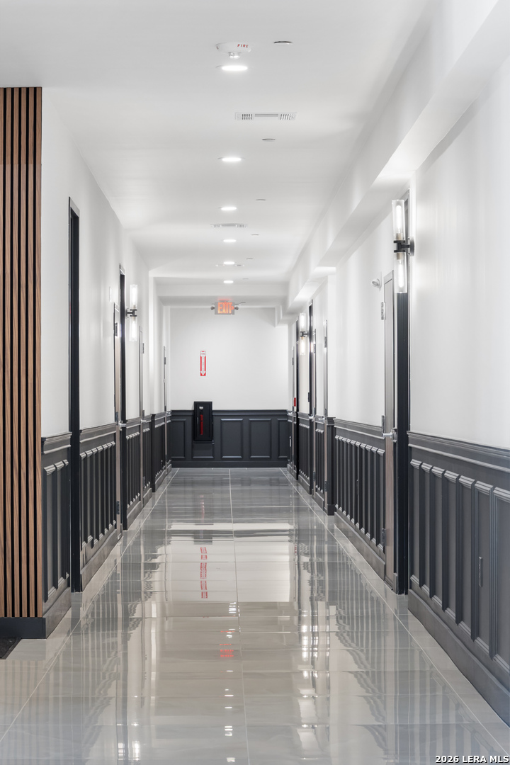 10899 South Hausman Road, Unit 207 San Antonio, TX 78249 - Photo 21 of 24 a view of a lobby with black and white walls