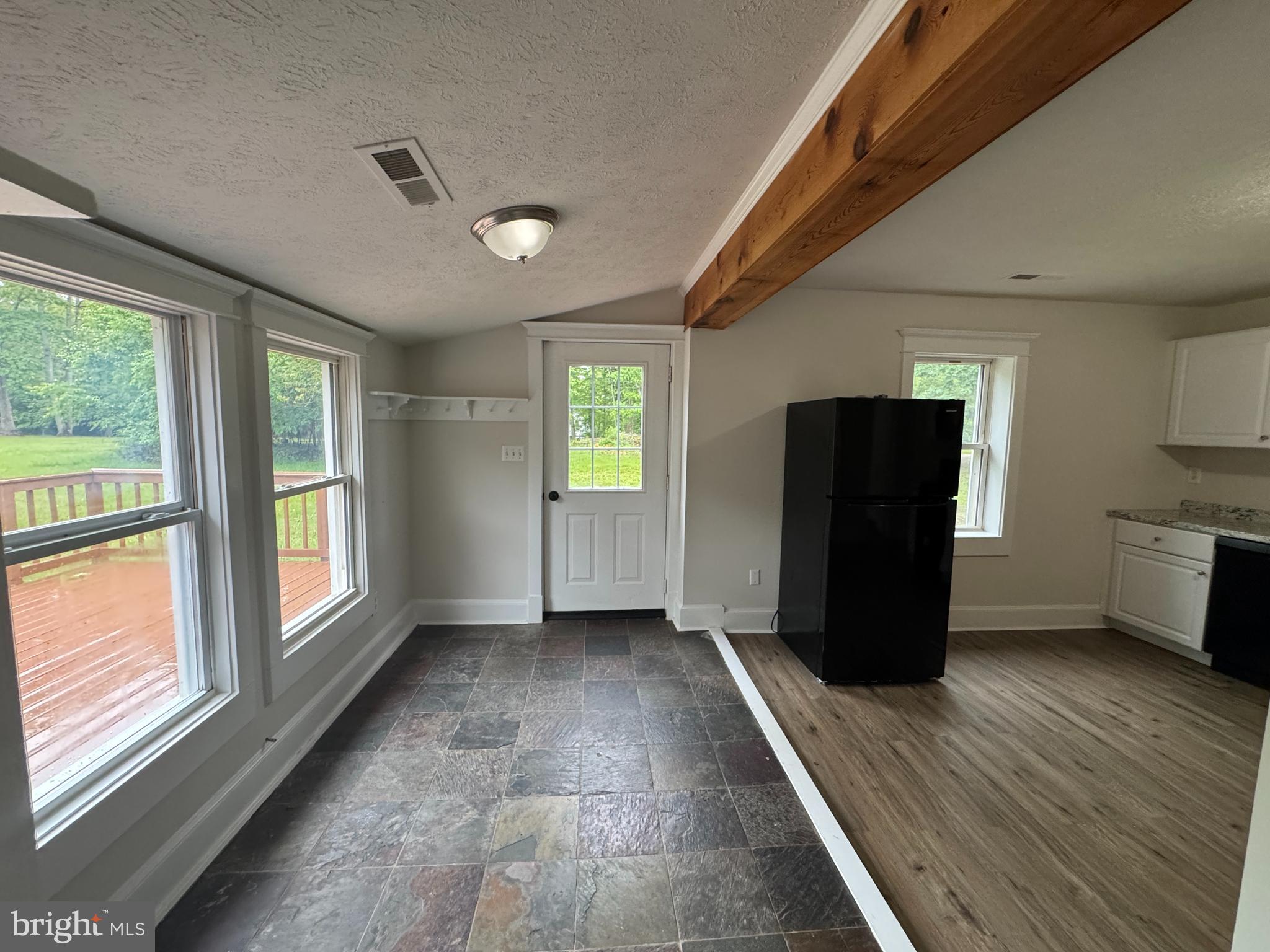 18163 Monrovia Road Orange, VA 22960 - Photo 11 of 15 a view of an empty room with window and wooden floor