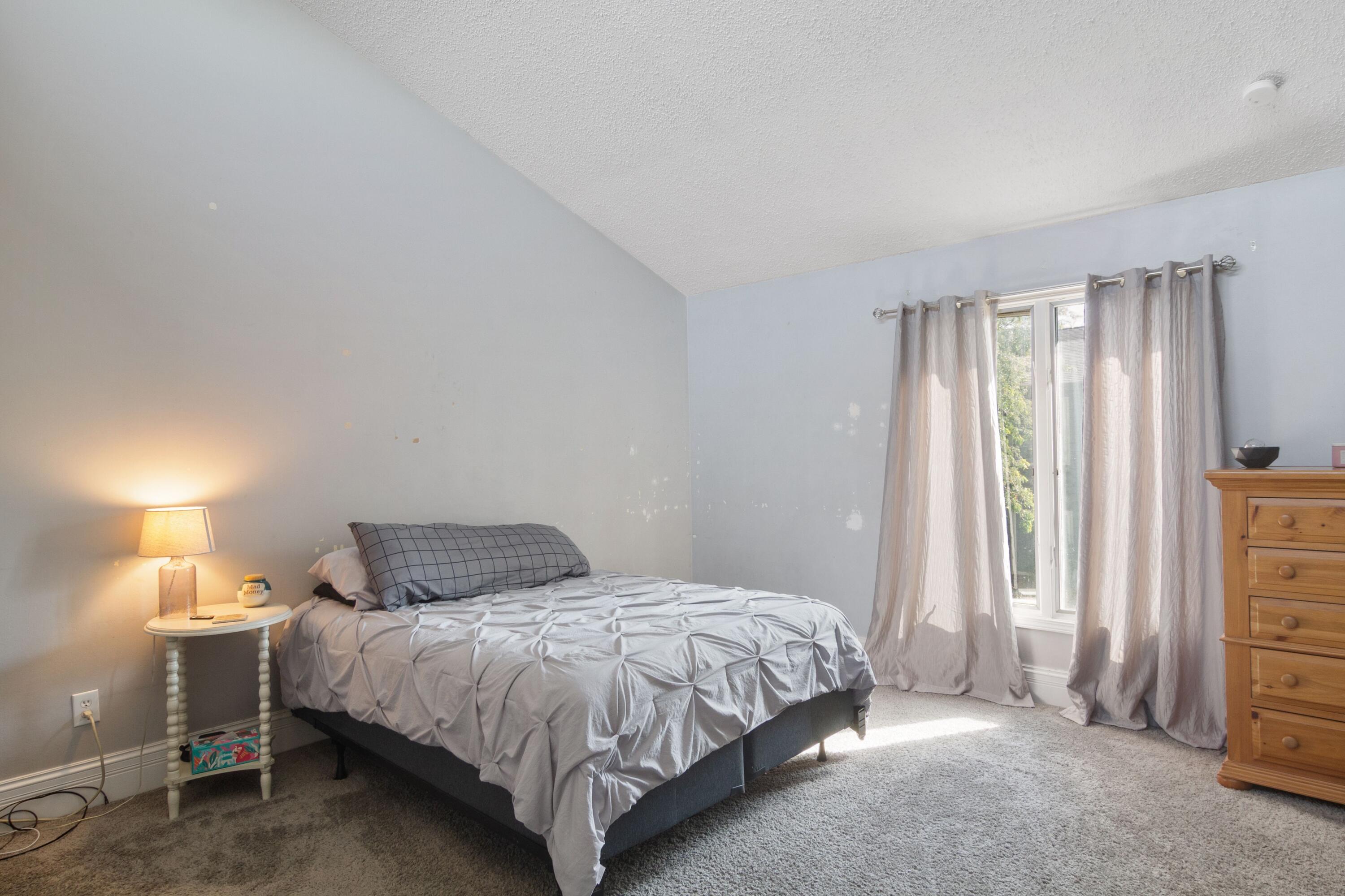 1847 Springvale Drive Crown Point, IN 46307 - Photo 15 of 22 a bedroom with a bed and a window