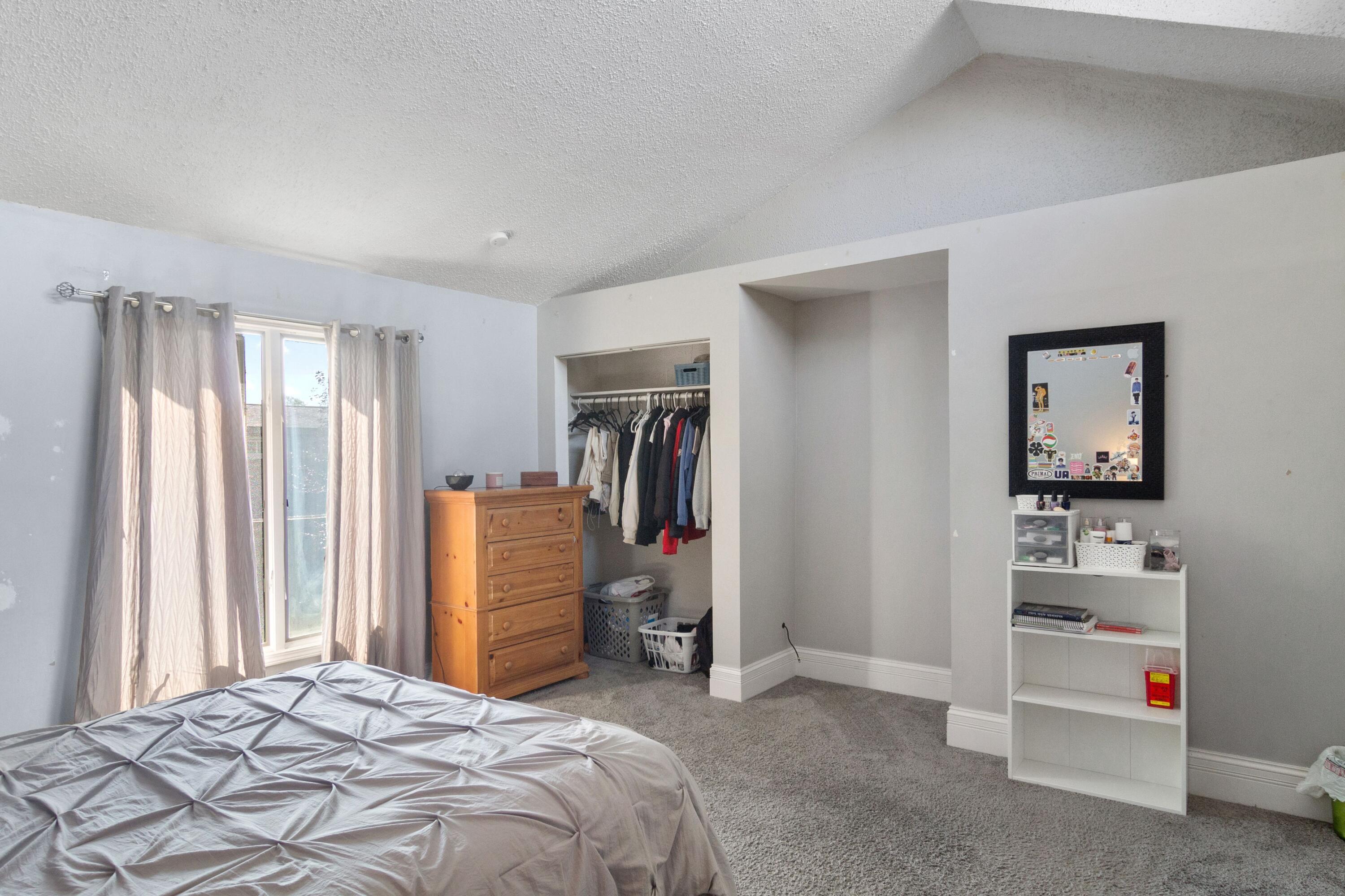 1847 Springvale Drive Crown Point, IN 46307 - Photo 16 of 22 a bedroom with a bed and a tv