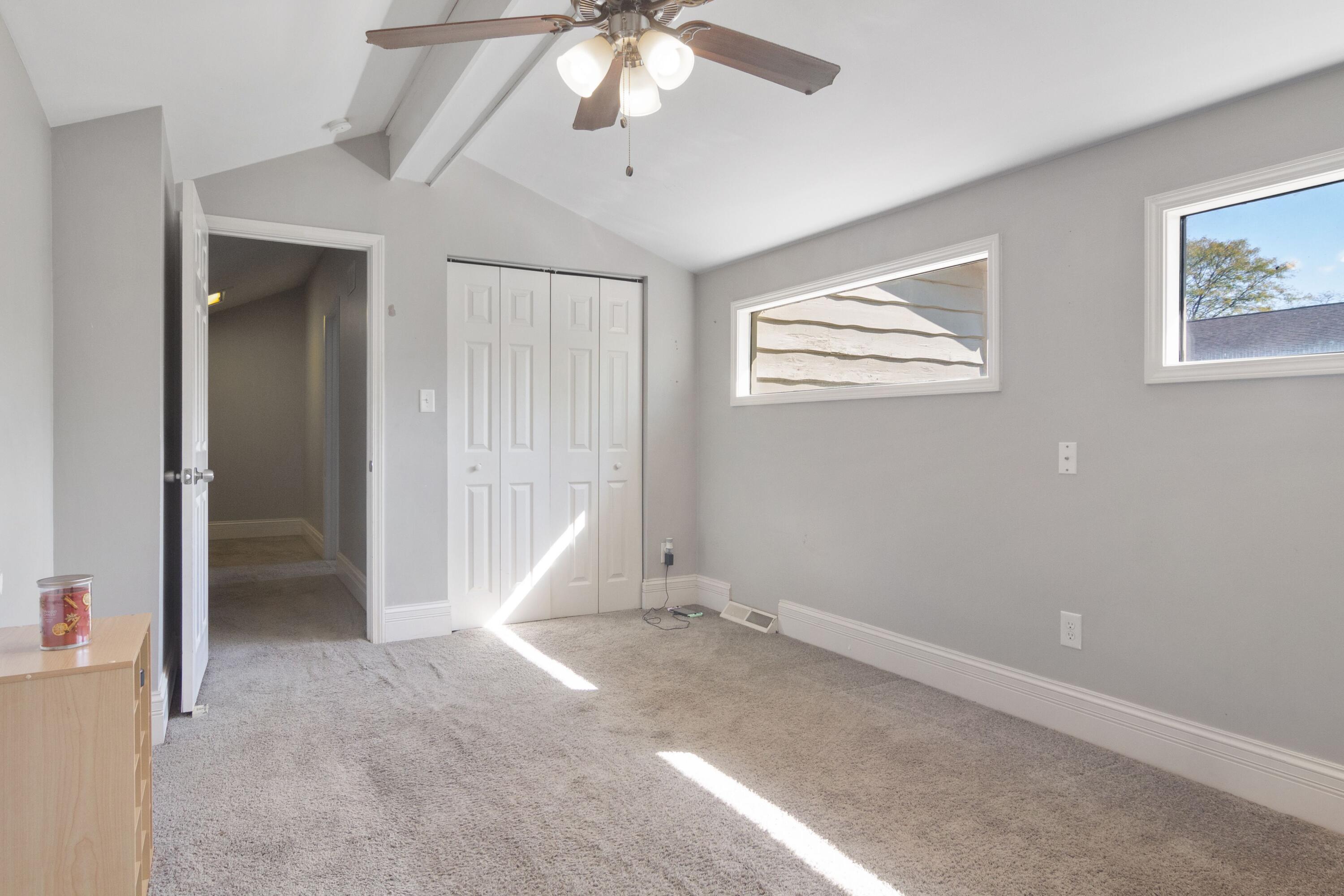 1847 Springvale Drive Crown Point, IN 46307 - Photo 18 of 22 an empty room with fan and windows
