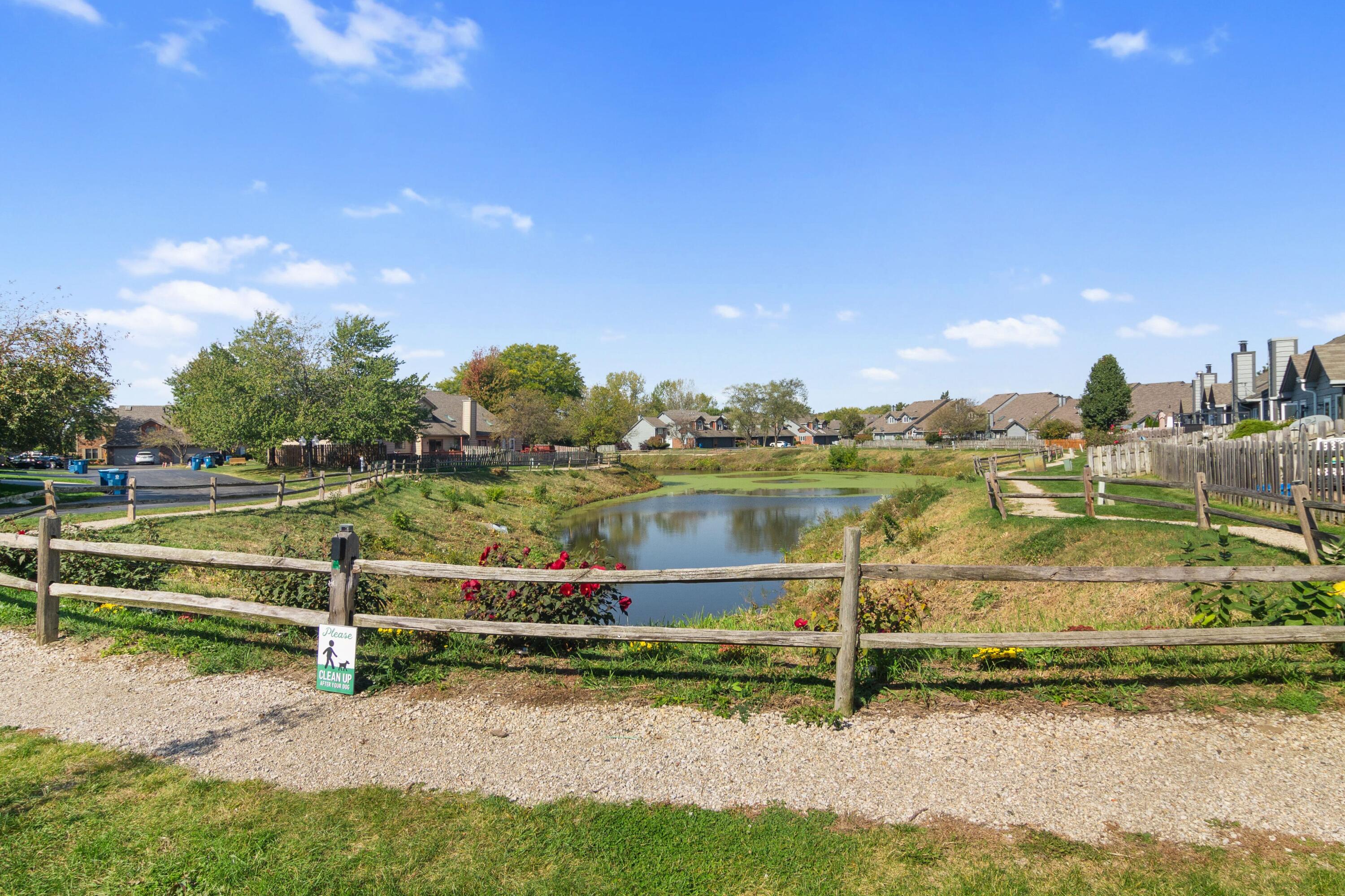 1847 Springvale Drive Crown Point, IN 46307 - Photo 21 of 22 a view of a lake with houses