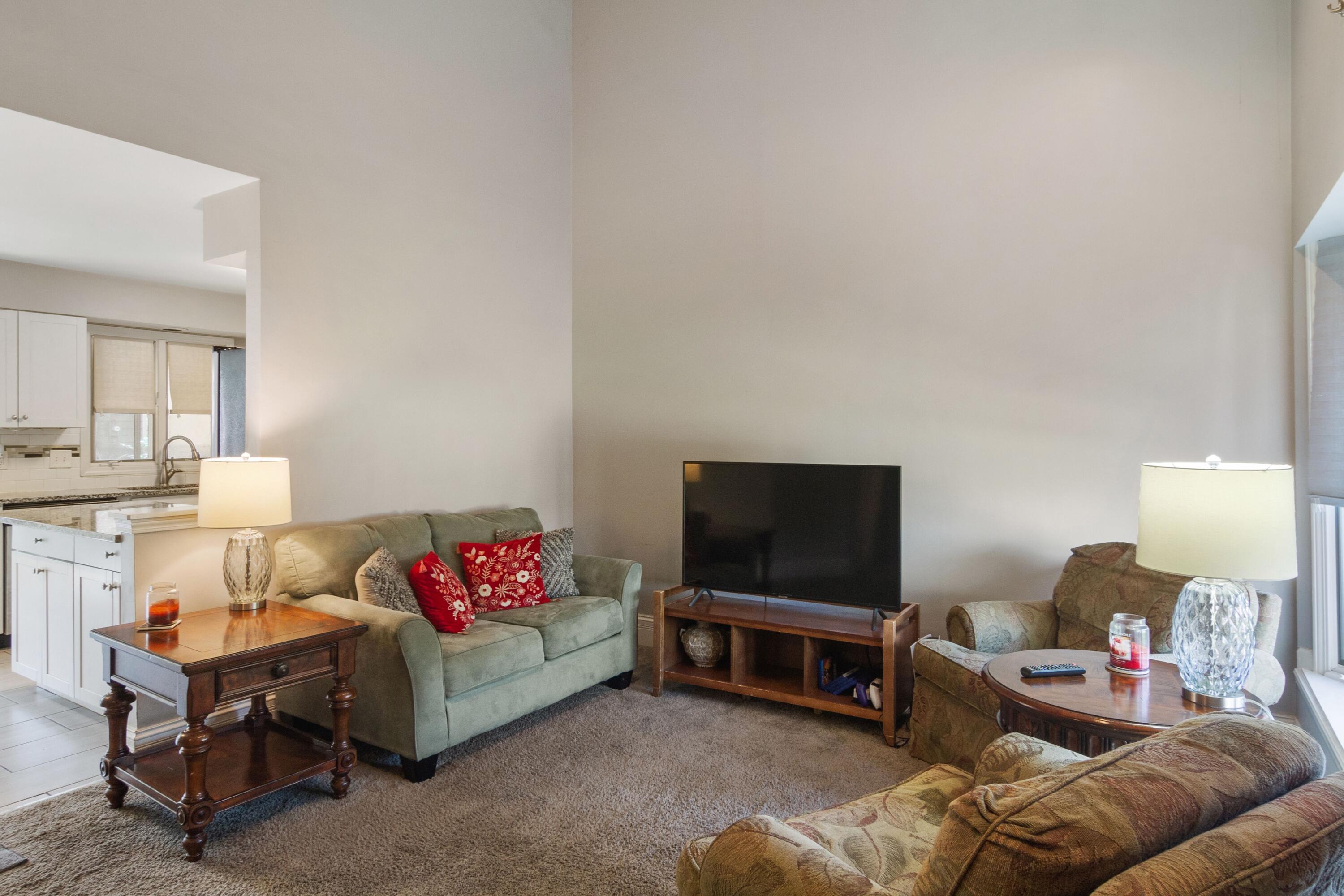 1847 Springvale Drive Crown Point, IN 46307 - Photo 3 of 22 a living room with furniture and a flat screen tv