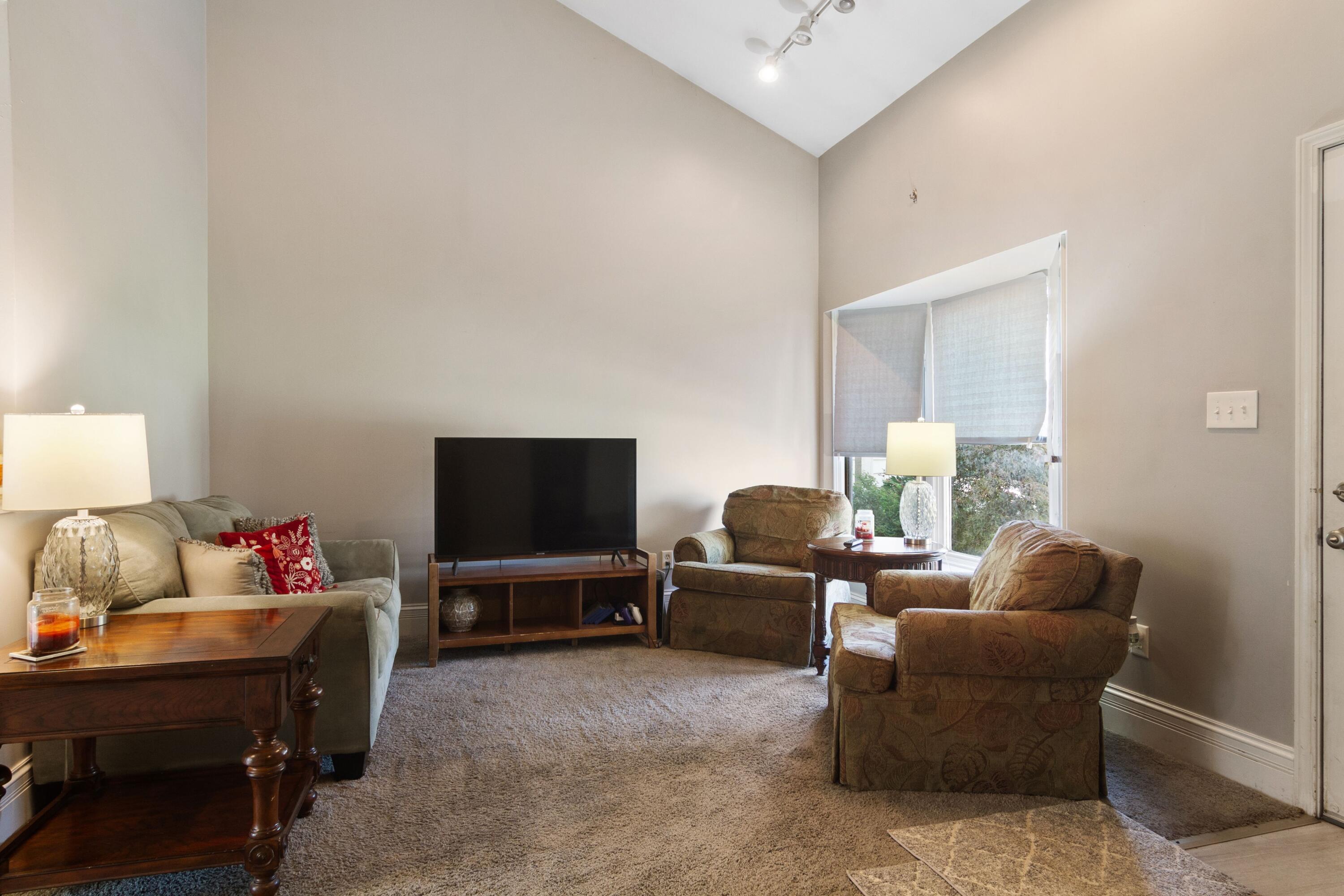 1847 Springvale Drive Crown Point, IN 46307 - Photo 4 of 22 a living room with furniture and a flat screen tv