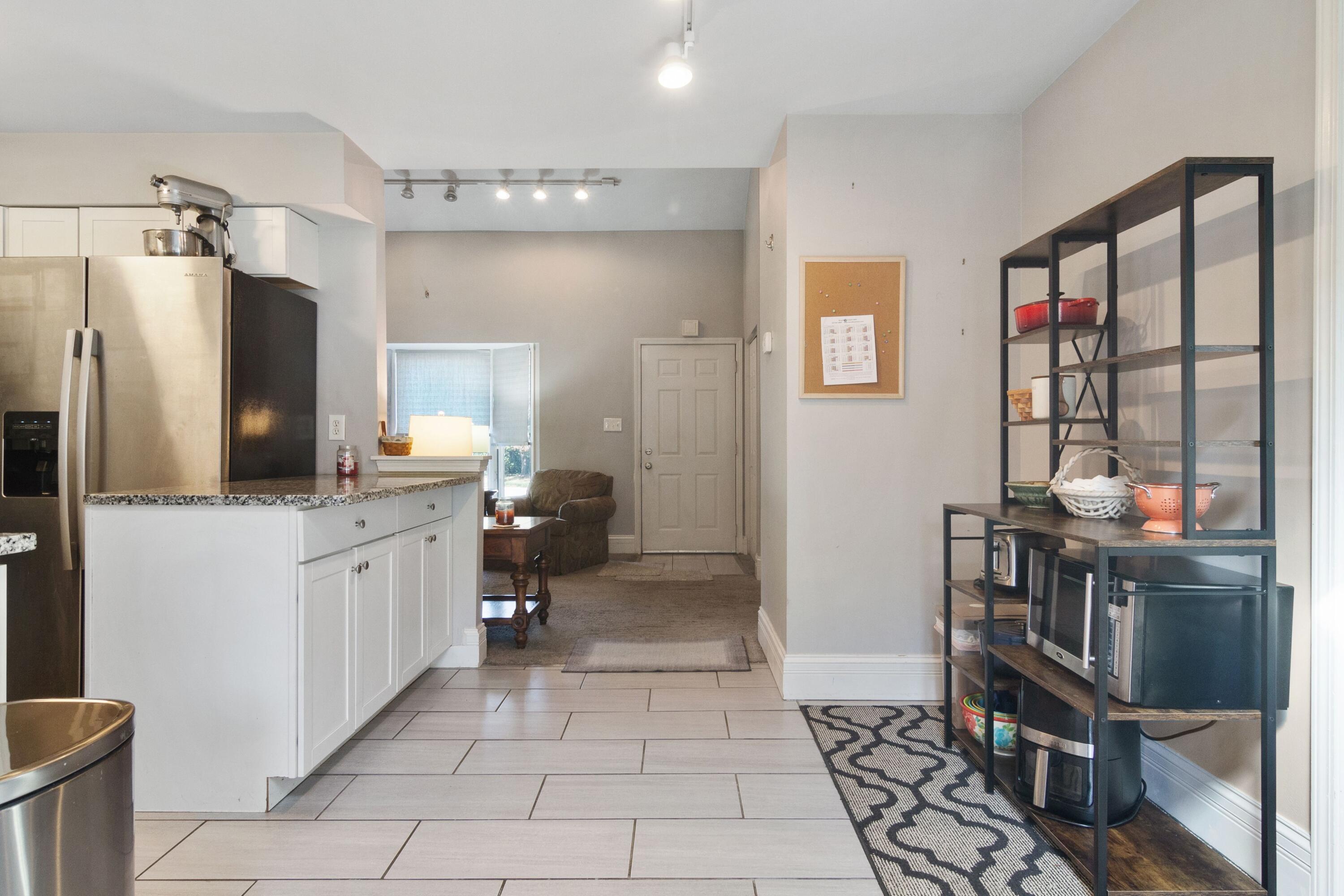 1847 Springvale Drive Crown Point, IN 46307 - Photo 9 of 22 a kitchen with stainless steel appliances a refrigerator and a stove