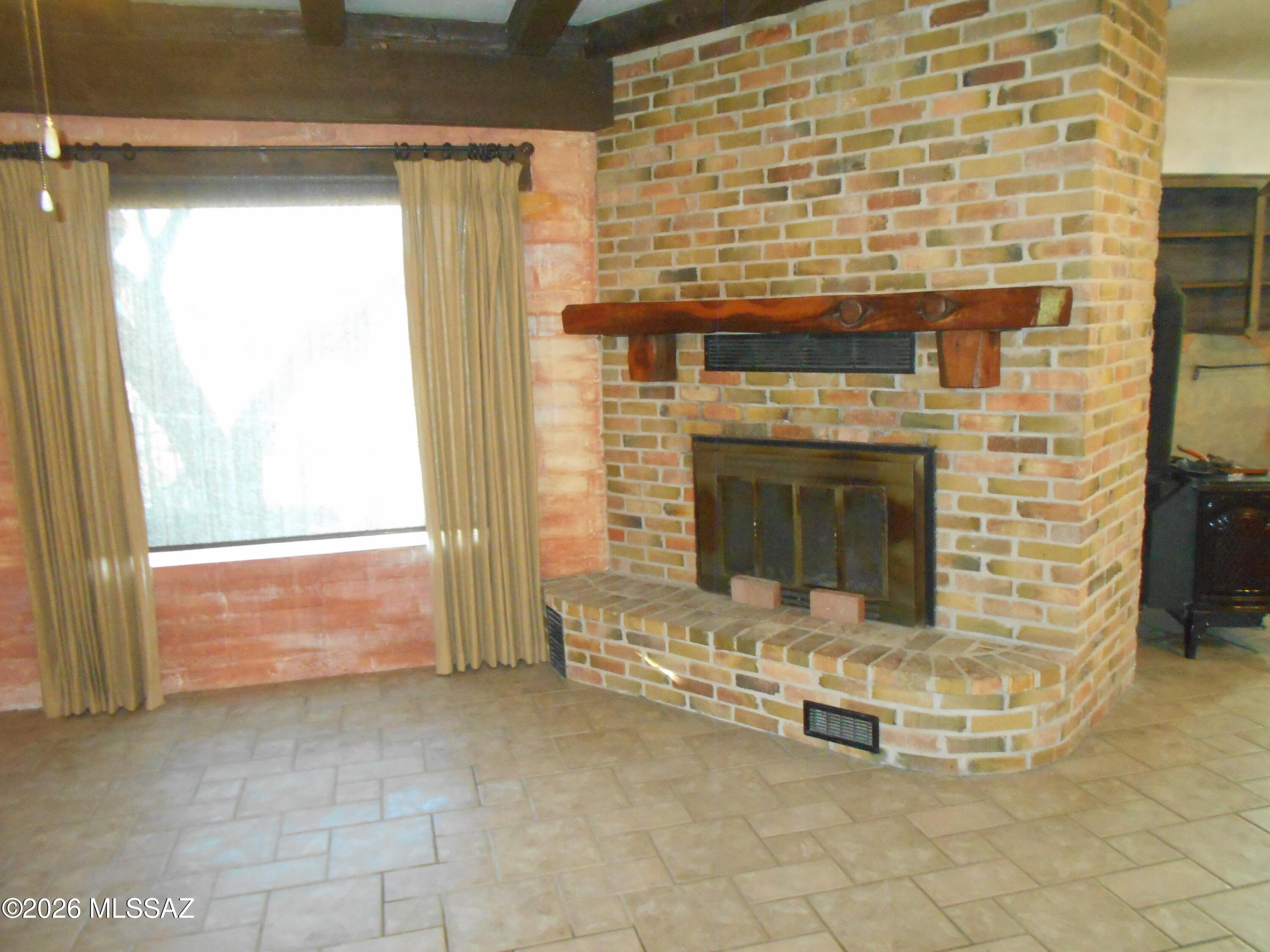 2223 North Ocotillo Road Benson, AZ 85602 - Photo 13 of 50 Fire place in Living Room