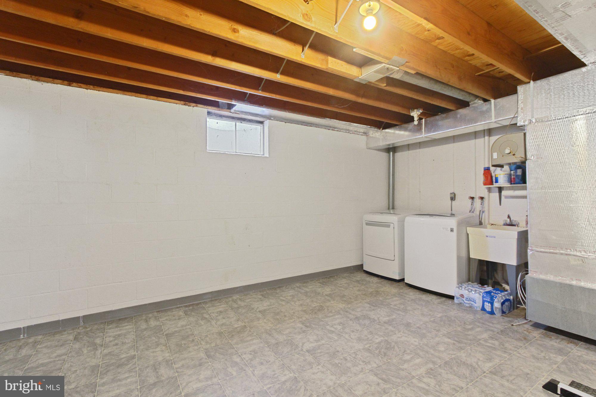 104 Chambers Ridge York, PA 17402 - Photo 21 of 24 Lower level utility room includes washer/dryer
