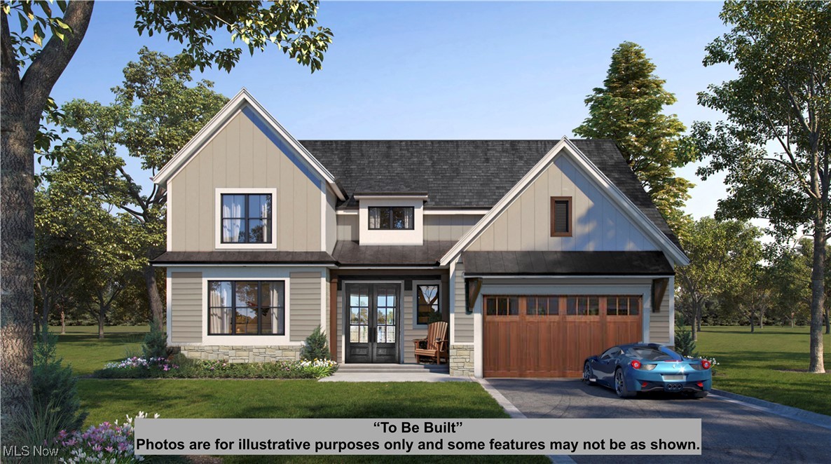 15813 Hemlock Road Chagrin Falls, OH 44022 - Photo 1 of 29 View of front facade featuring french doors, driveway, a front lawn, board and batten siding, and stone siding