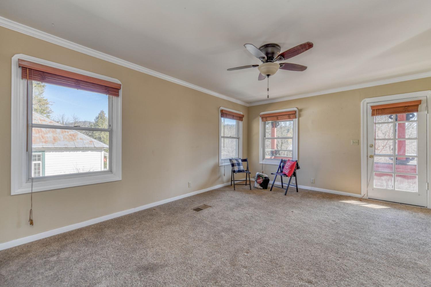 21335 Consolation Street Volcano, CA 95689 - Photo 16 of 41 a view of a livingroom with a window and furniture