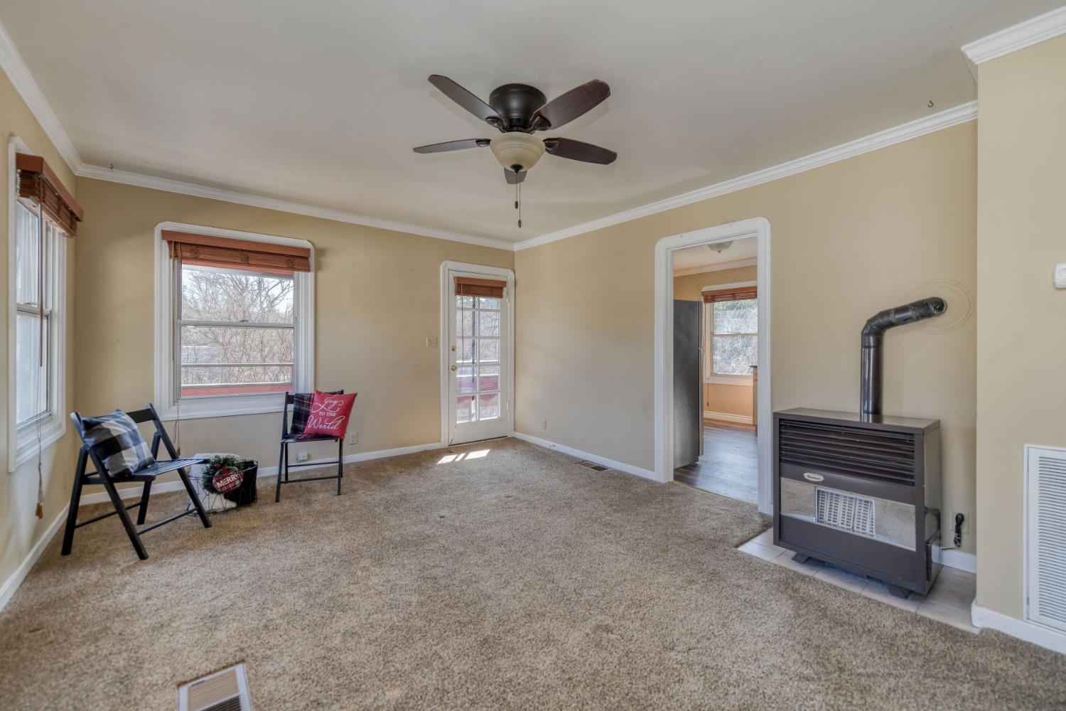 21335 Consolation Street Volcano, CA 95689 - Photo 17 of 41 a living room with furniture and a window