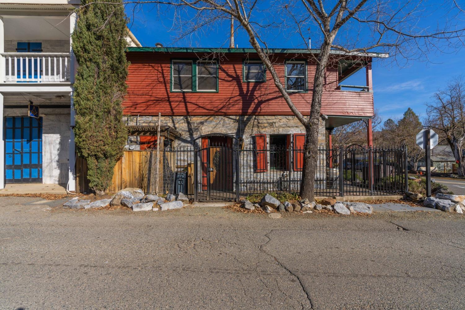 21335 Consolation Street Volcano, CA 95689 - Photo 2 of 41 a group of people sitting in front of a building