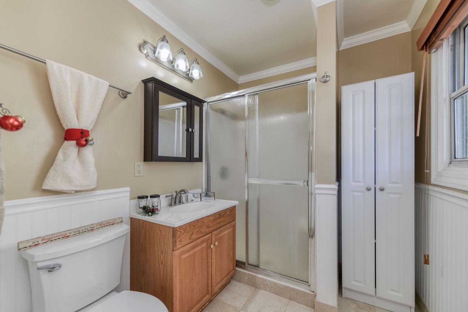 21335 Consolation Street Volcano, CA 95689 - Photo 34 of 41 a bathroom with a sink vanity and a mirror