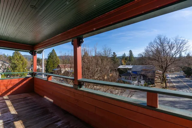a view of a fire pit in front of the house