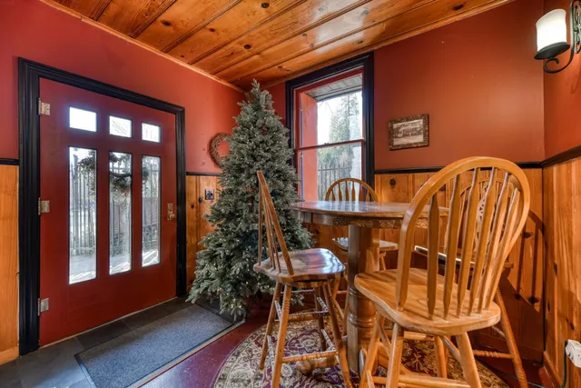 a view of a chairs and table in a room