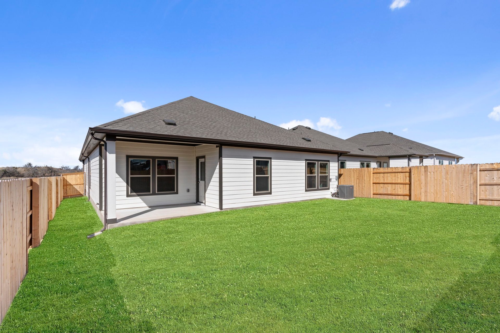 13613 Gray Landing Drive Elgin, TX 78621 - Photo 26 of 33 Rear of Home and Private Backyard