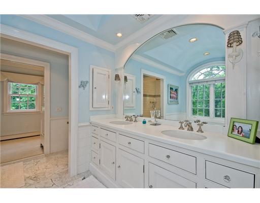 593 Hollow Tree Ridge Road Darien, CT 06820 - Photo 14 of 20 a bathroom with a sink and a mirror