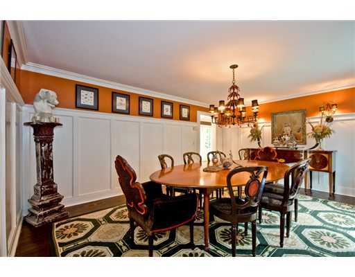 593 Hollow Tree Ridge Road Darien, CT 06820 - Photo 5 of 20 a view of a dining room with furniture and chandelier