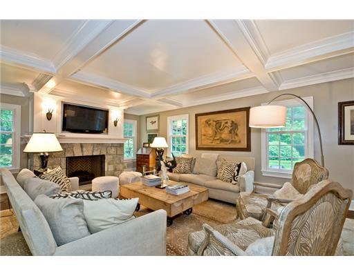 593 Hollow Tree Ridge Road Darien, CT 06820 - Photo 8 of 20 a living room with furniture a fireplace and a flat screen tv